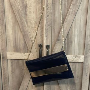Navy clutch with gold detail